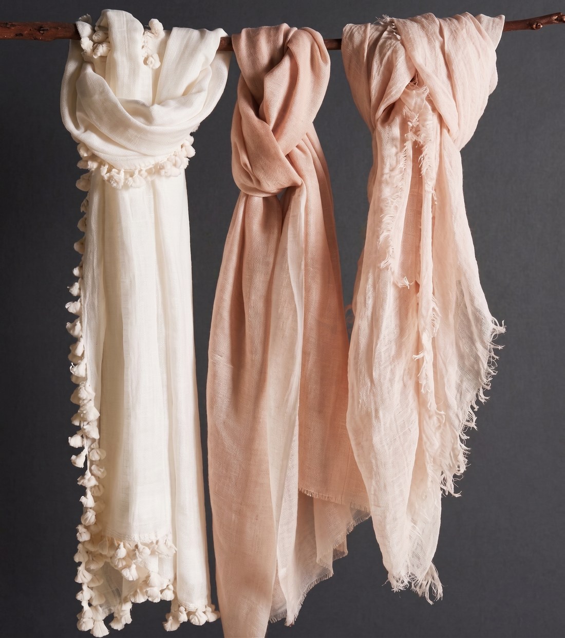 Tasselled scarves in natural and blush